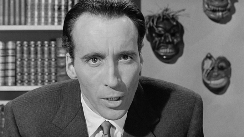 Christopher Lee in a library