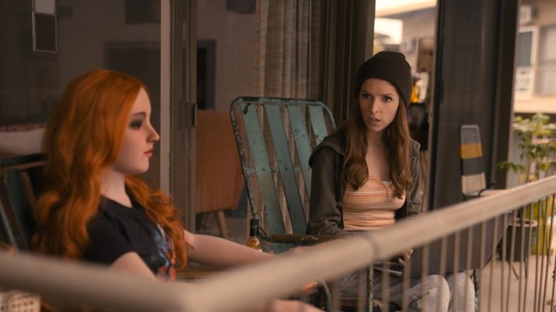 Anna Kendrick talks to a doll