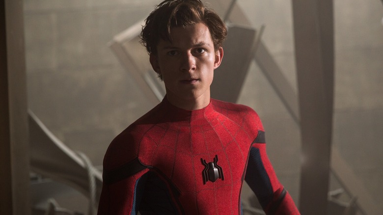 Peter Parker unmasked in Spider-Man suit in "Spider-Man: Homecoming" (2017)