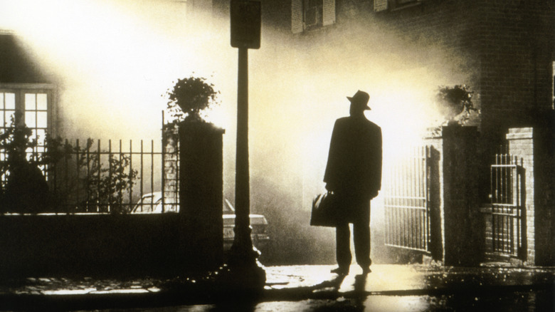 Father Merrin standing in silhouette in "The Exorcist" (1973)