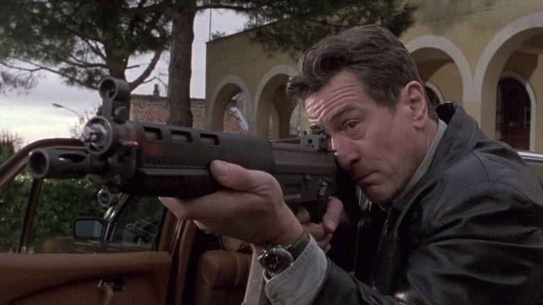 Sam aims a huge gun in Ronin (1998)