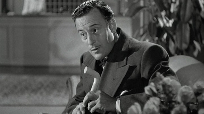 Dr. Judd talks to a patient on his couch in The Cat People (1942)