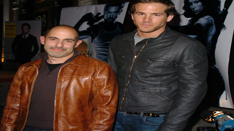 Ryan Reynolds smiling with David Goyer