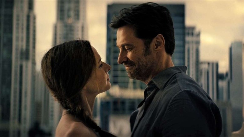 Mae and Nick looking at each other lovingly in "Reminiscence" (2021)