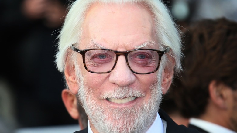 Donald Sutherland wearing tinted glasses