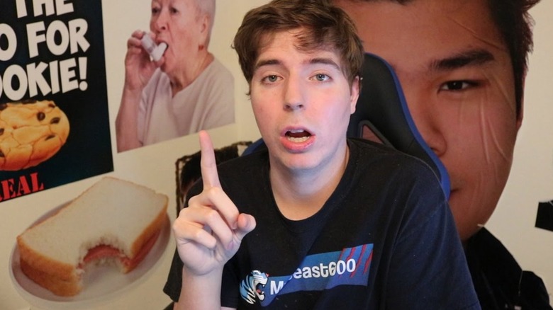 MrBeast holding up finger while counting