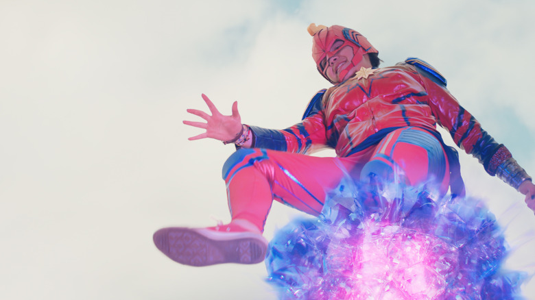 Ms. Marvel walking on energy blast