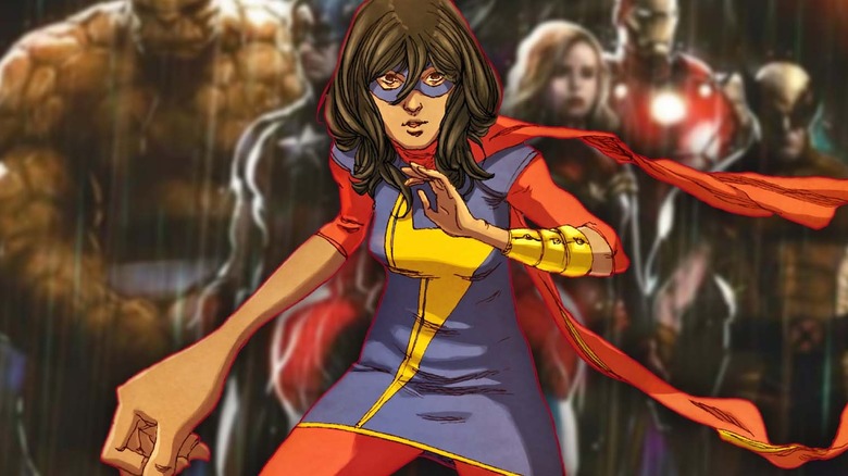 Ms. Marvel standing in front of Marvel heroes