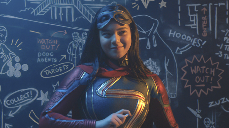 Ms. Marvel in front chalkboard