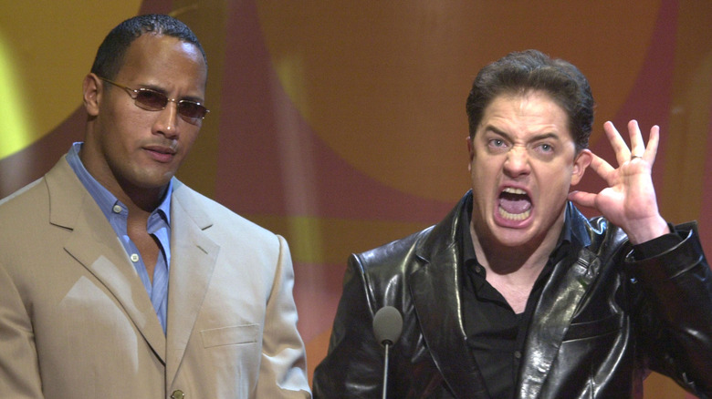 Brendan Fraser and Dwayne Johnson on stage