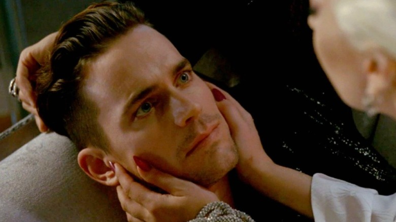 American Horror Stories' Lady Gaga holding Matt Bomer's face