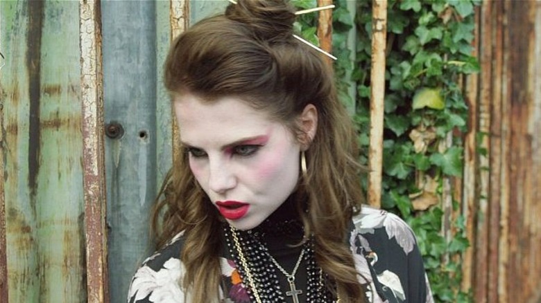 Raphina wearing her music video outfit in Sing Street