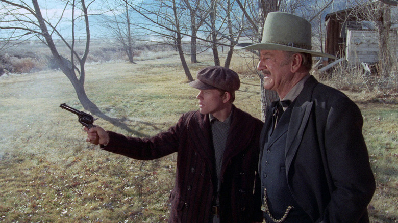 J. B. Books teaches Gillom Rogers to shoot a gun in "The Shootist" (1976)