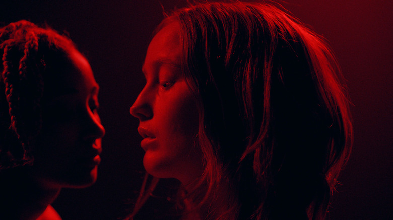 Bobbi and Jonny in the dark under red light