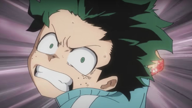 Deku throwing punch 