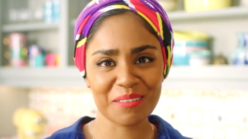 Nadiya Hussain smiles in her kitchen