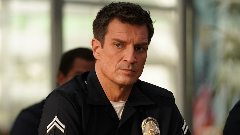 John Nolan sitting during a briefing in 