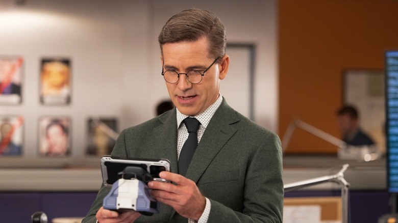 Brian Dietzen's Jimmy Palmer tinkering with a chatbot on NCIS