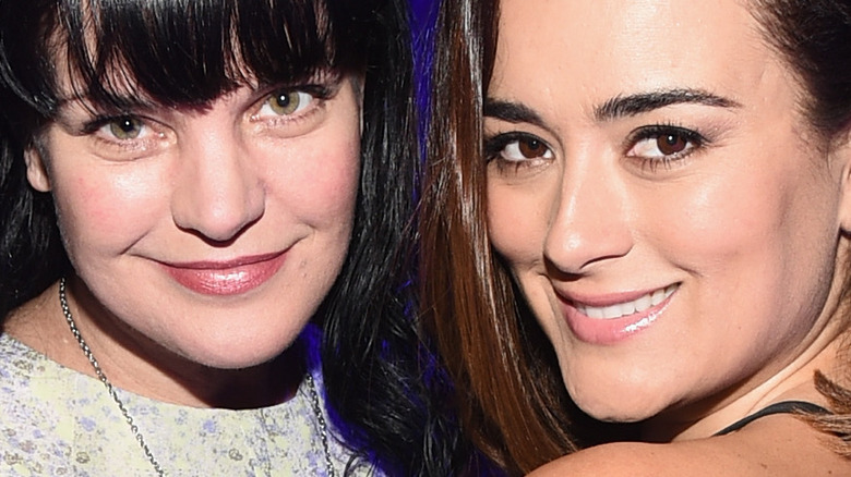 Pauley Perrette and Cote de Pablo smiling 