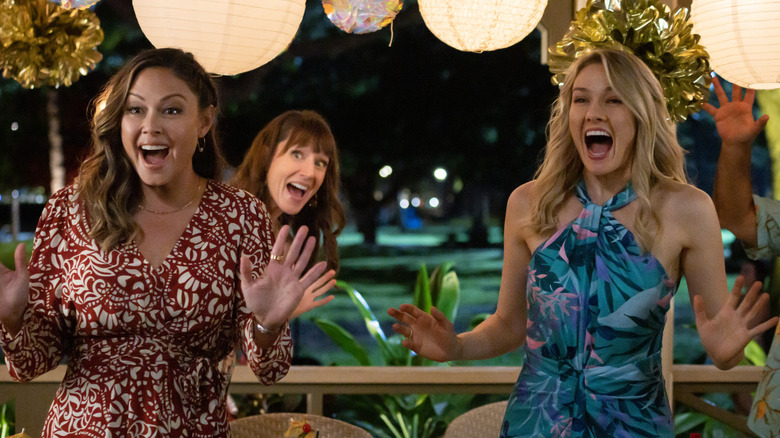 Jane Tennant, Commander Chase, and Kate Whistler cheering 