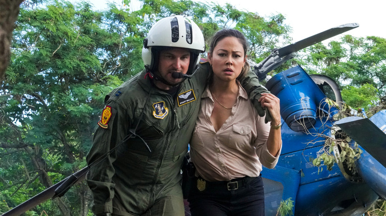 Jane helps a helicopter pilot escape a crash