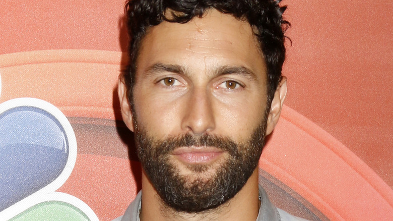 Noah Mills attending an event