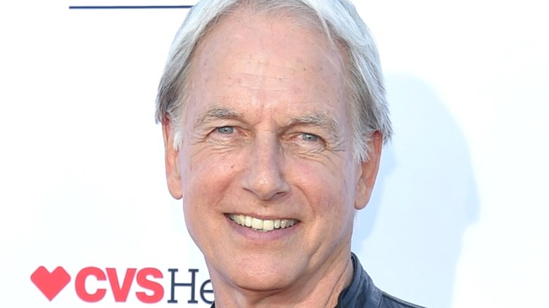 Mark Harmon smiling for photographers 