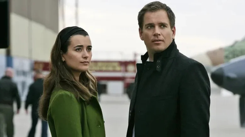 Ziva and Tony standing outdoors