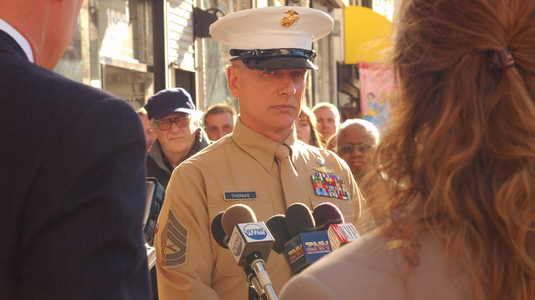Gibbs at a press conference in his dress browns in "NCIS" (2003-present)
