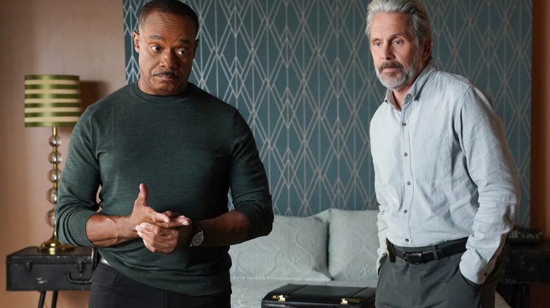 Agent Parker and Director Vance in the hotel