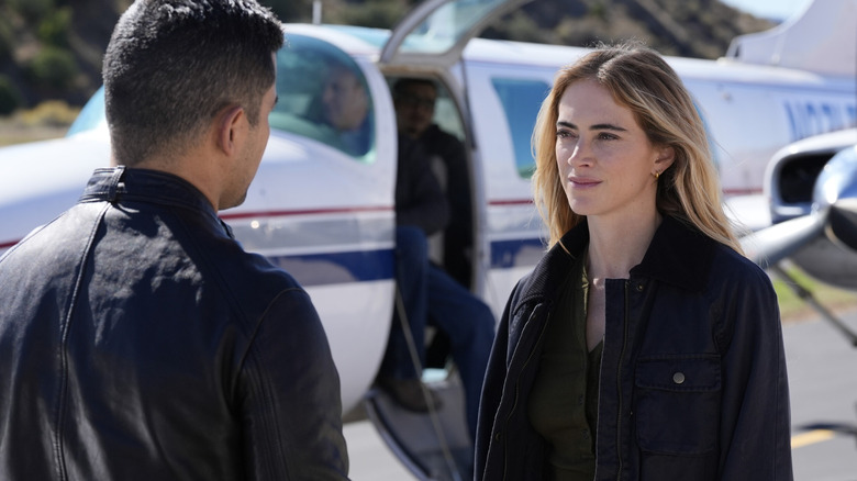 Ellie Bishop looking at Nick Torres outside by plane in "NCIS"