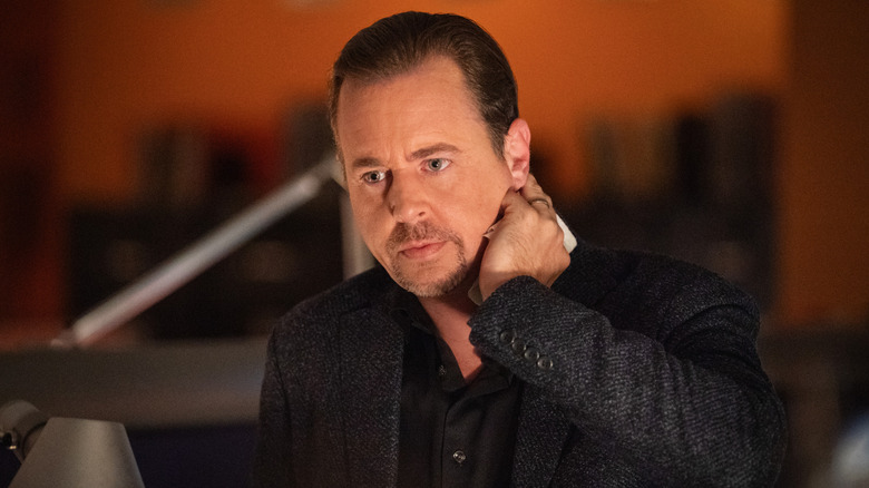 Tim McGee grabs the back of his neck in "NCIS"