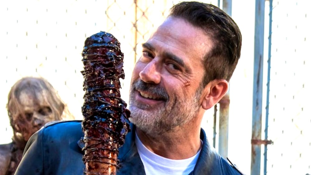 Walking Dead's Negan holding bloody Lucille bat