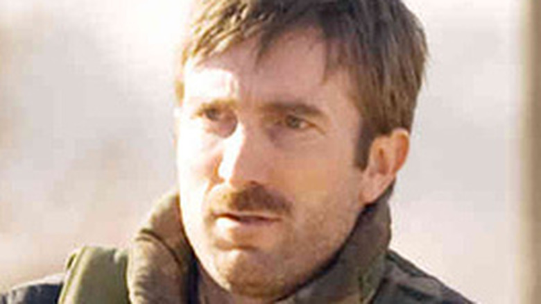 Sharlto Copley looking weathered