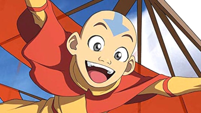 Aang flying smiling