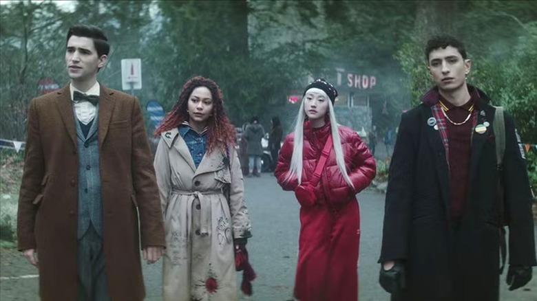 The "Dead Boy Detectives" crew walking down the street together
