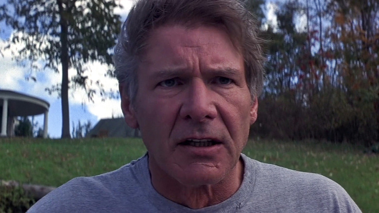 Harrison Ford as Norman Spencer looking distressed in 
