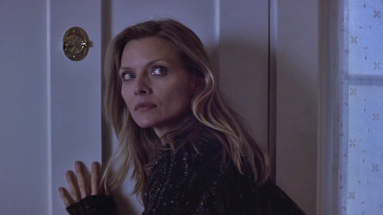 Michelle Pfeiffer as Claire looking suspiciously in 