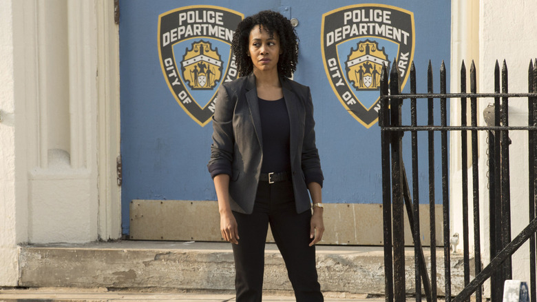Misty Knight standing in front of a police station in Luke Cage (2016)