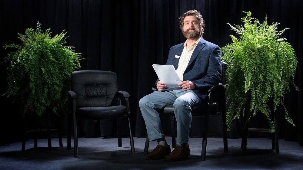 Zach Galifianakis between two ferns