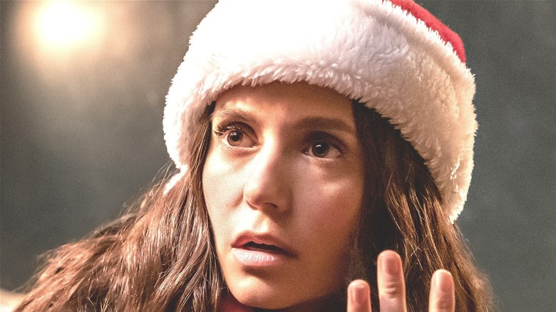 Nina Dobrev surprised in santa hat 