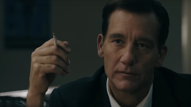 Sam Spade holds a cigarette in "Monsieur Spade" (2024)