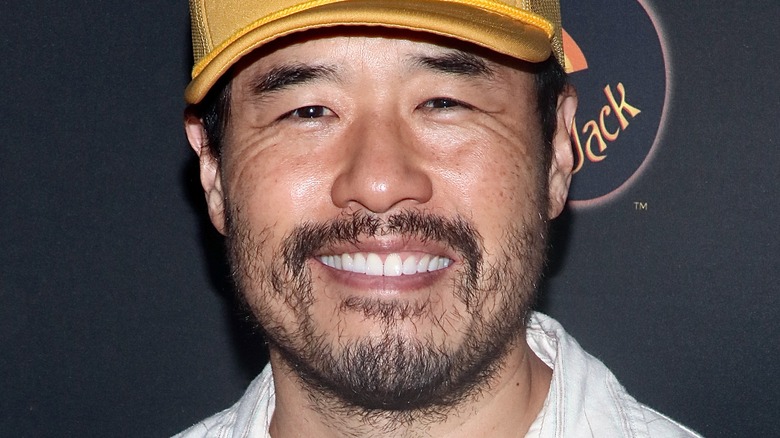 Randall Park smiling into camera