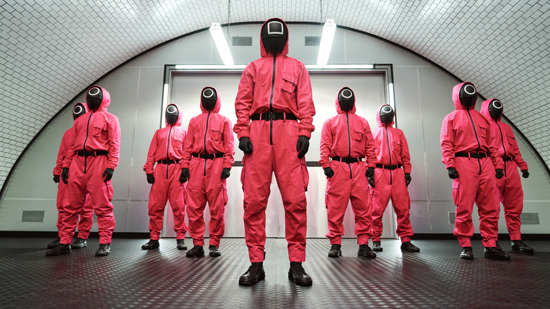 Squid Game guards stand in line-up