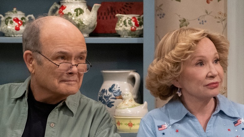 Kurtwood Smith and Debra Jo Rupp looking aside