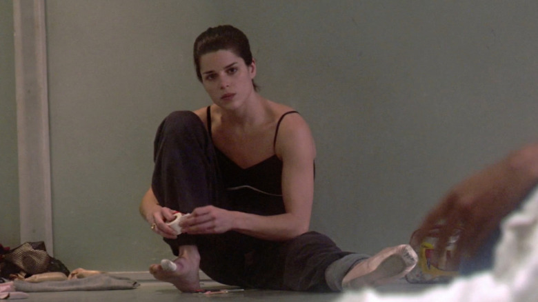Neve Campbell puts on ballet shoes in studio