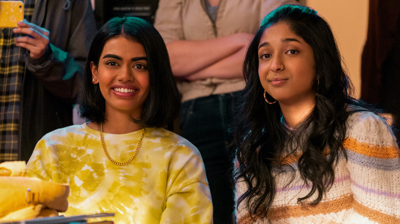 Anessa and Devi smiling at school