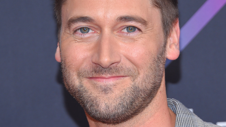 Ryan Eggold smiling