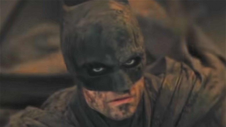Robert Pattinson gets dirty as Batman in The Batman