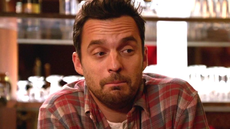 Nick Miller stifles laugh